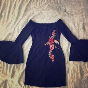 Black tight off the shoulder dress